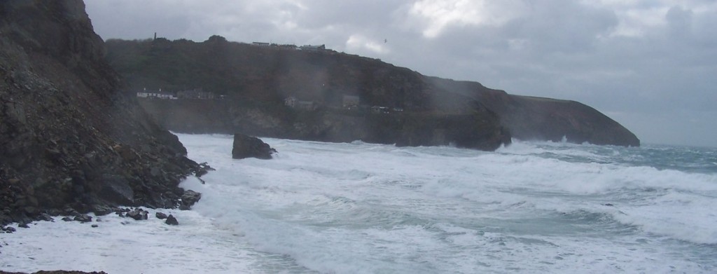 Big waves mining ore from the cliffs