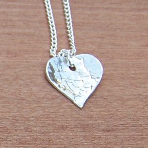 Heart pendant with hammered finish